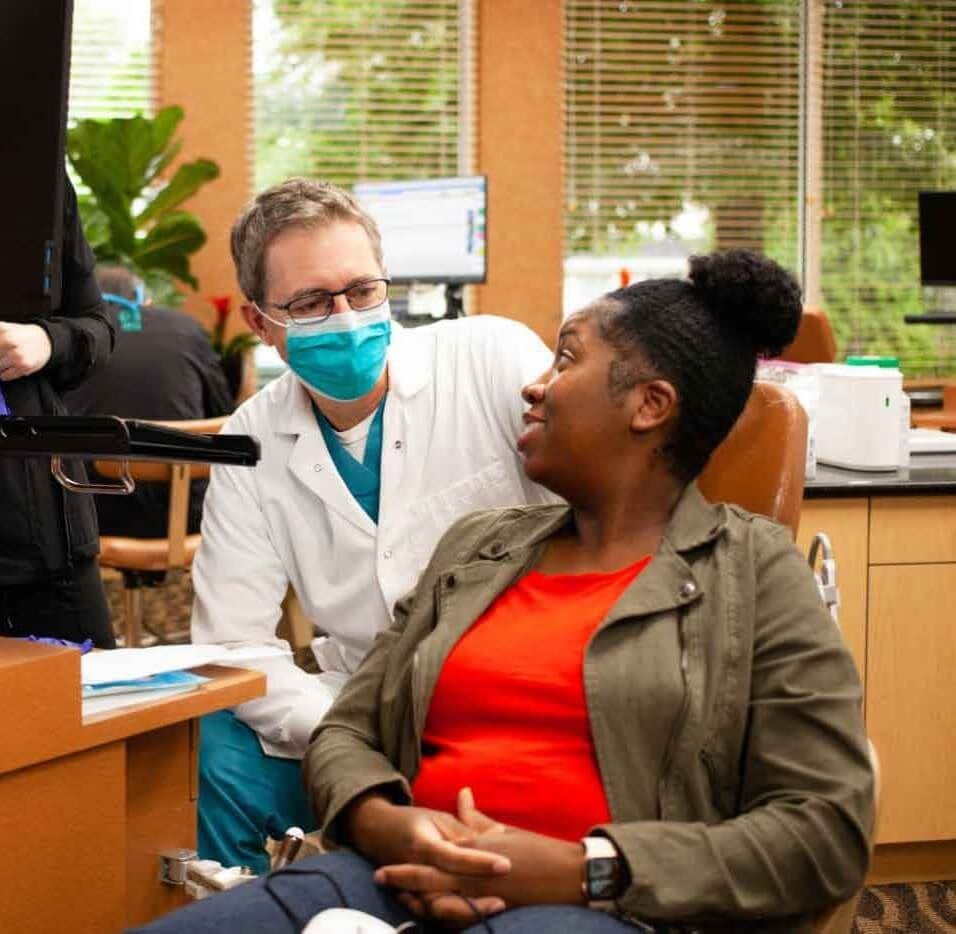 Orthodontist with patient